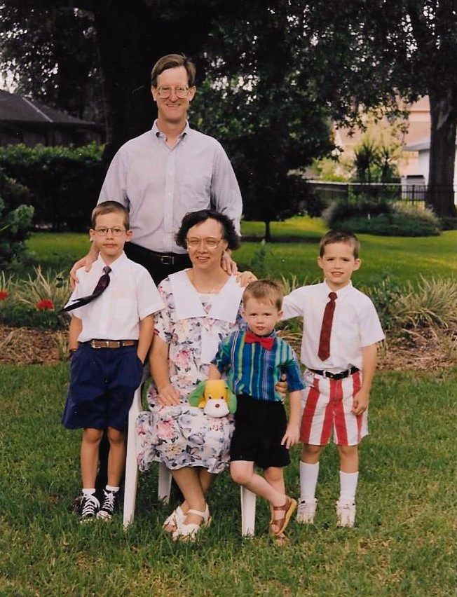 Mom And Dad With Three Young Sons